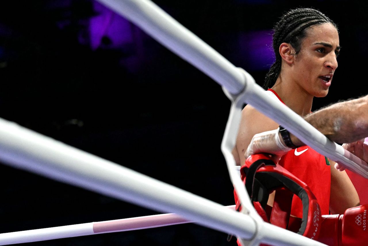 Algeria's Imane Khelif watches during her women's 66kg preliminaries round of 16 boxing match against Italy's Angela Carini during the Paris 2024 Olympic Games at the North Paris Arena, in Villepinte on August 1, 2024. (AFP)
