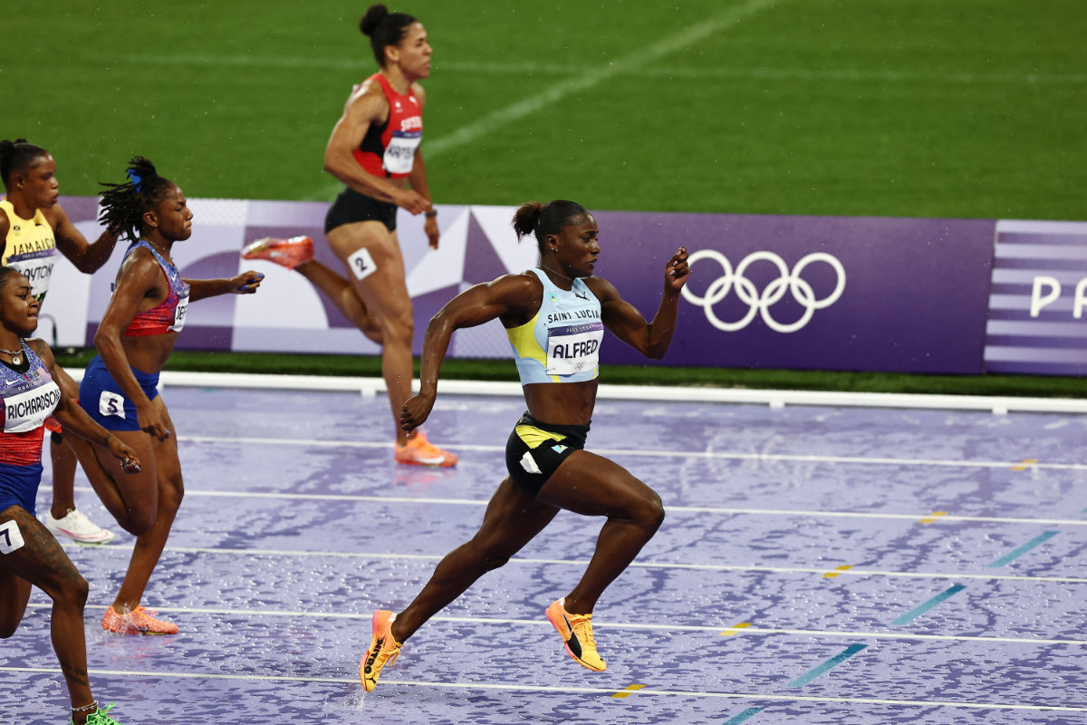 Julien Alfred of Saint Lucia in action during the Women's 100 meters finals of the Paris 2024 Olympics at the Stade de France, Saint-Denis, France on August 03, 2024. (REUTERS)