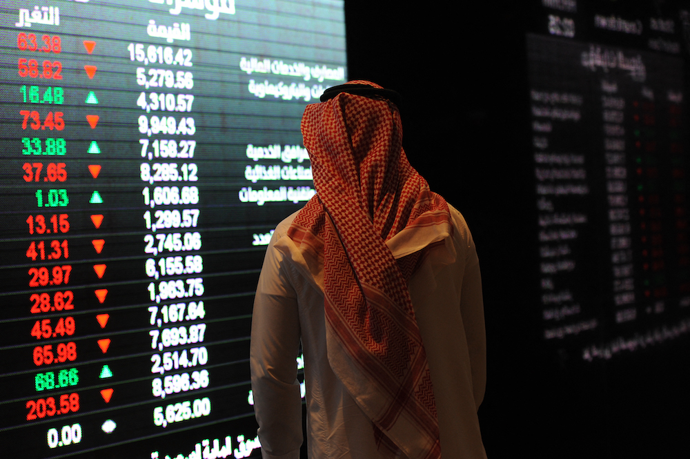 A Saudi investor monitors the stock exchange at the Saudi Stock Exchange, or Tadawul, in the capital Riyadh. File/AFP