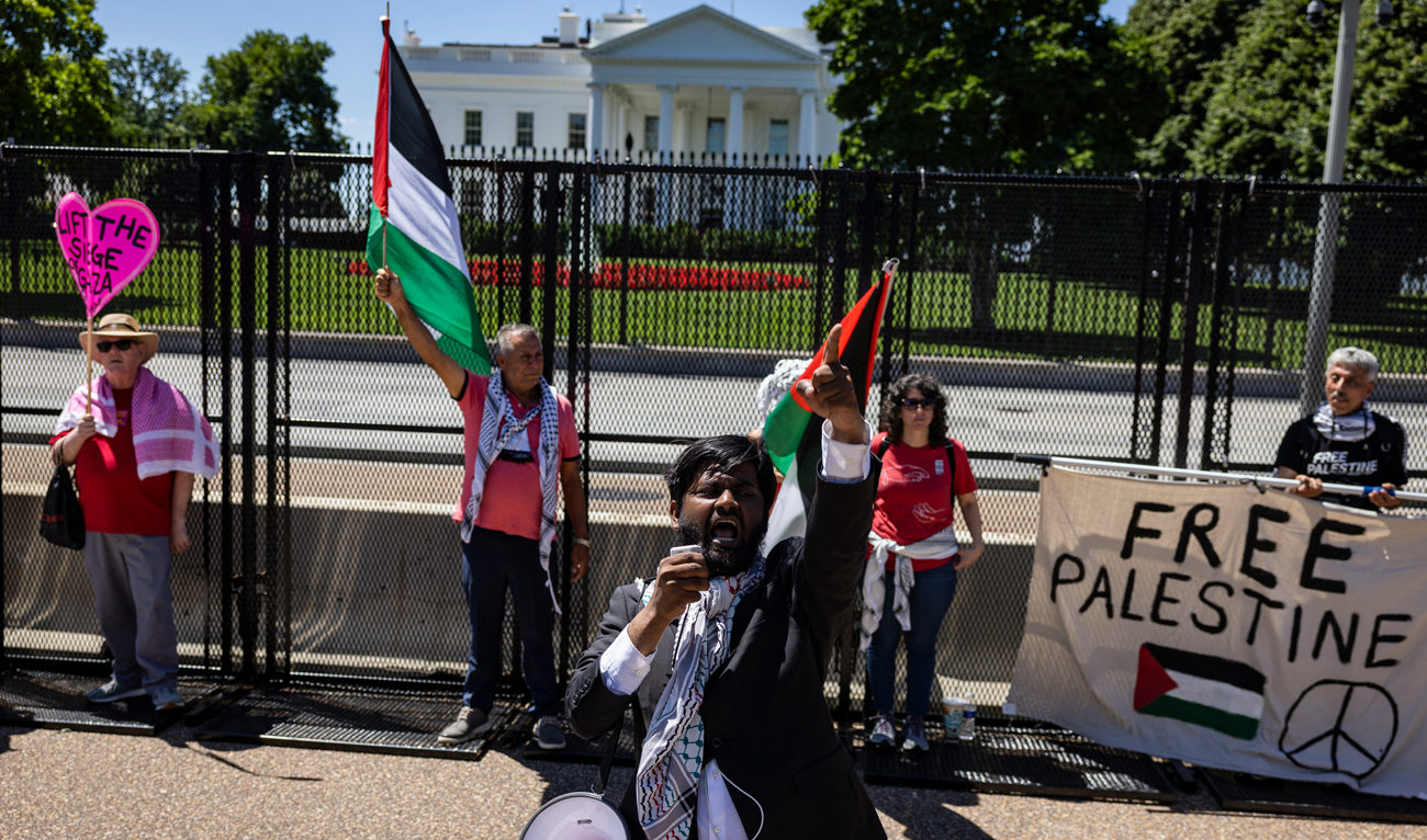 A pro-Palestinian activist leads chants in front of the White House during a demonstration protesting the war in Gaza on June 8, 2024 in Washington, DC. (AFP/File)