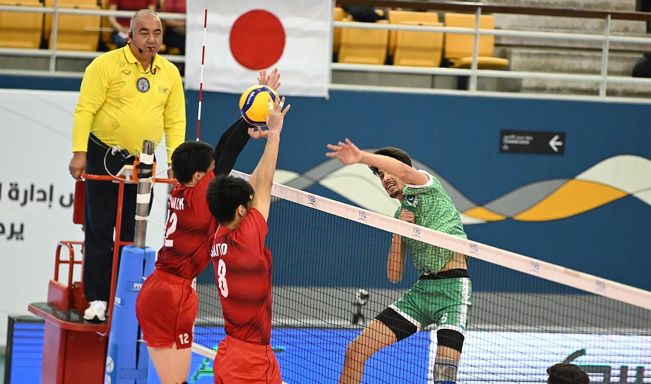 Pakistani and Japanese players jump to block the ball during the Pakistan vs Japan match at the Asian Men’s U18 Volleyball Championship in Bahrain on August 4, 2024. (@AsianVolleyball/X)