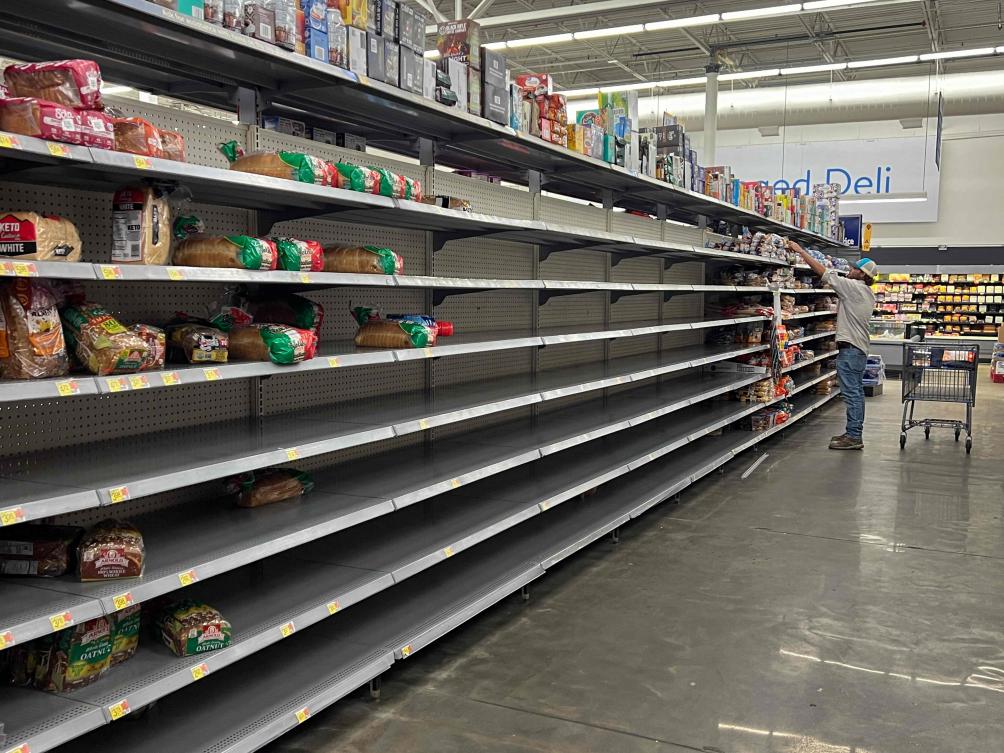 A bread aisle is almost bare in a Walmart store as people stock up before the arrival of Hurricane Debby on Aug. 04, 2024 in Cedar Key, Florida. (Getty Images North America/AFP)