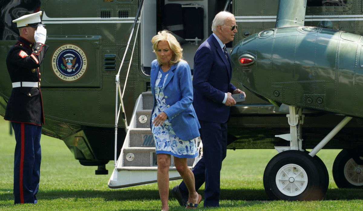 US President Joe Biden walks toward the Oval Office as first Lady Jill Biden walks toward the residence upon their return from Wilmington to the White House in Washington, US, August 5, 2024. (REUTERS)