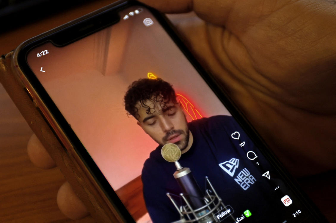 Above, Iranian singer Shervin Hajipour sings ‘Baraye’ in a recorded video, which became a viral hit on different social media platforms, with millions of views within days. (AFP)