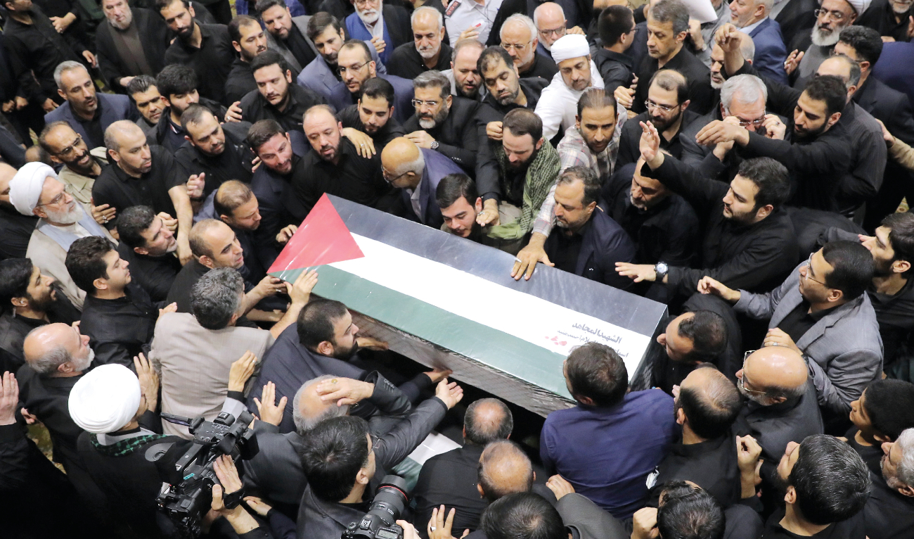 Mourners gather during a funeral procession for Ismail Haniyeh, political leader of Hamas, who was killed during a visit to Tehran, on July 31. (AFP/Getty Image)