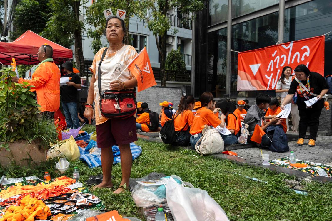 Above, supporters gather at the Move Forward Party headquarters in Bangkok wait for Thailand’s Constitutional Court ruling on Aug. 7, 2024. (AFP)