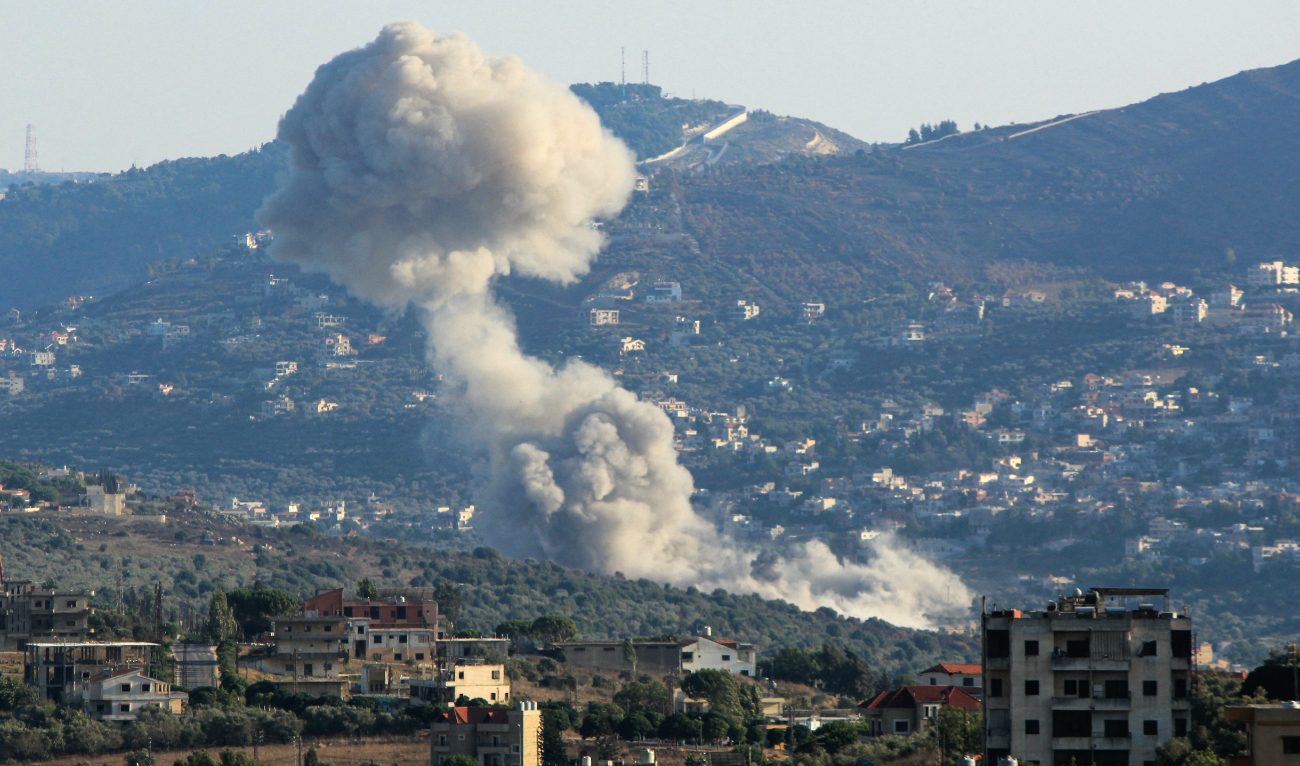 Smoke billows from the site of an Israeli strike on the southern Lebanese village of Kfar Kila on August 6, 2024. (AFP/File)
