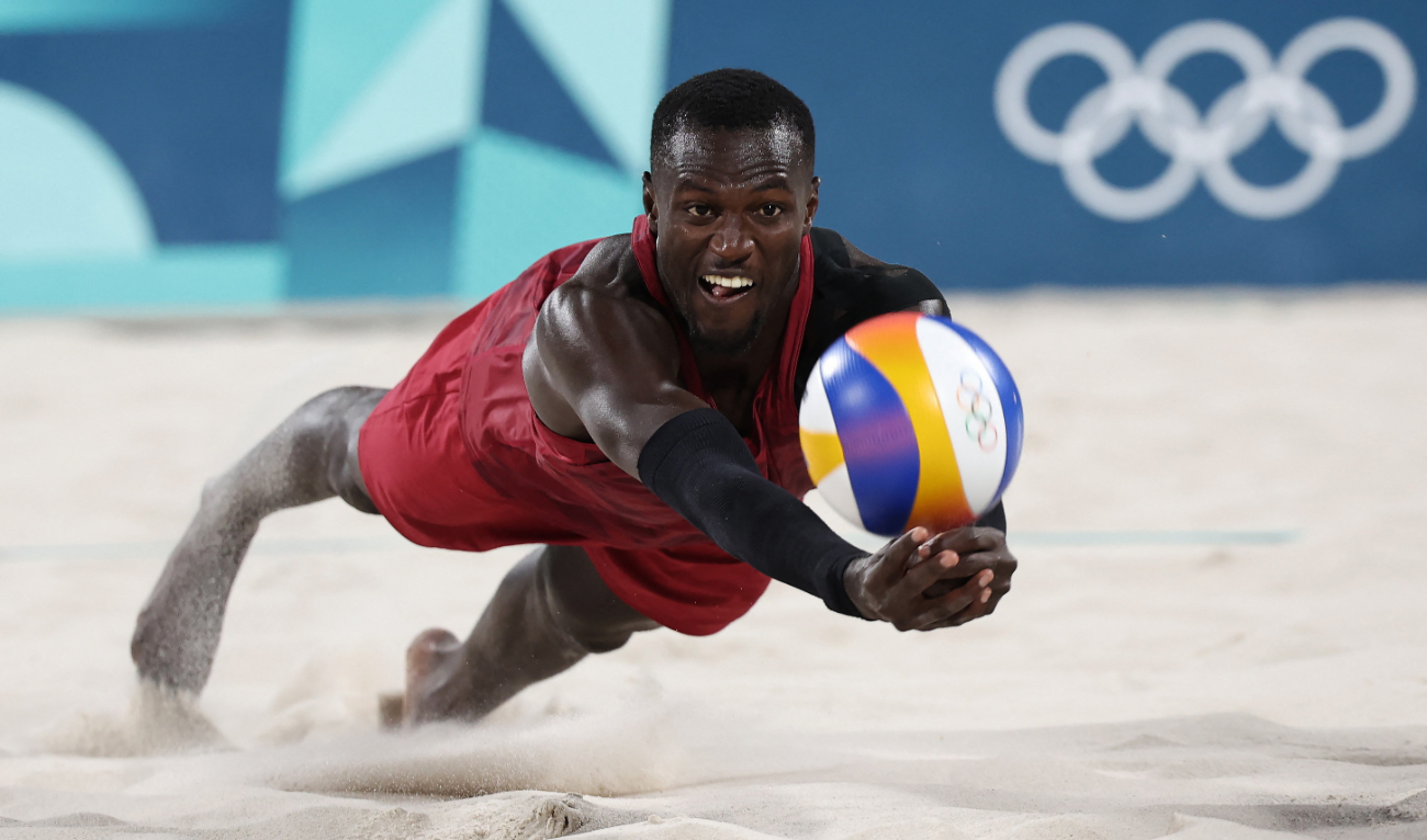 Cherif Younousse of Qatar in action during the men's beach volleyball quarterfinal match against the US in the Paris 2024 Olympics at the Eiffel Tower Stadium, Paris, on Wednesday. (Reuters)