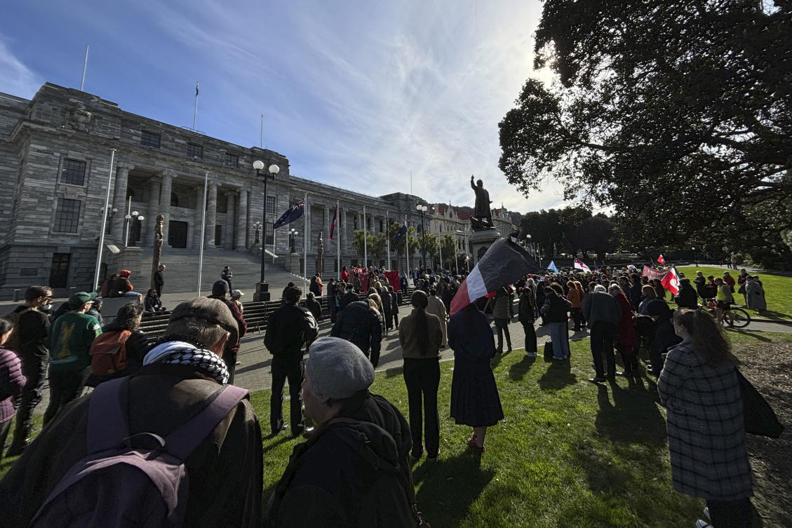 Protesters gathered outside Parliament in this week to oppose the government’s plans to repeal a clause requiring recognition of children’s Maori heritage from the law governing the child protection system. (AP)