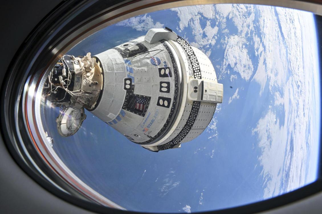 Above, Boeing’s Starliner spacecraft to docked to the ISS Harmony module’s forward port on July 3, 2024. NASA has been buying Boeing more time to do more testing and gather more data to build a better case to trust Starliner. (NASA via AP)