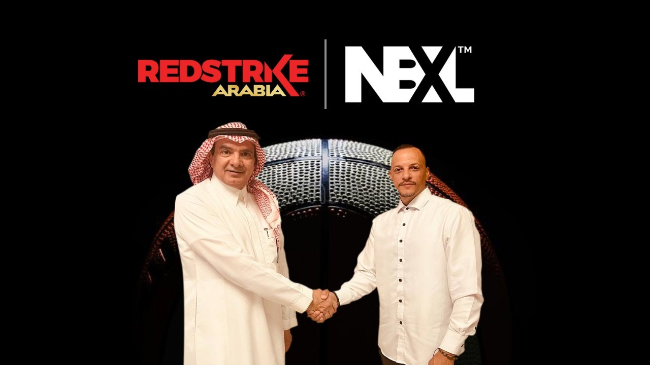 Christian Villar, founder and owner of NBXL, shakes hands with Saad Houtan, Executive Partner of Redstrike Arabia, after announcing a partnership between the two brands (Supplied)