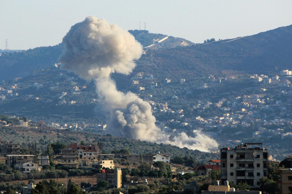 Smoke billows from the site of an Israeli strike on the southern Lebanese village of Kfar Kila on Aug. 6, 2024. (AFP)