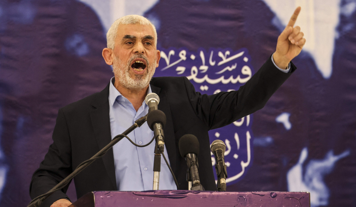 Head of the political wing of the Palestinian Hamas movement in the Gaza Strip Yahya Sinwar speaks during a meeting in Gaza City on April 30, 2022. (AFP)