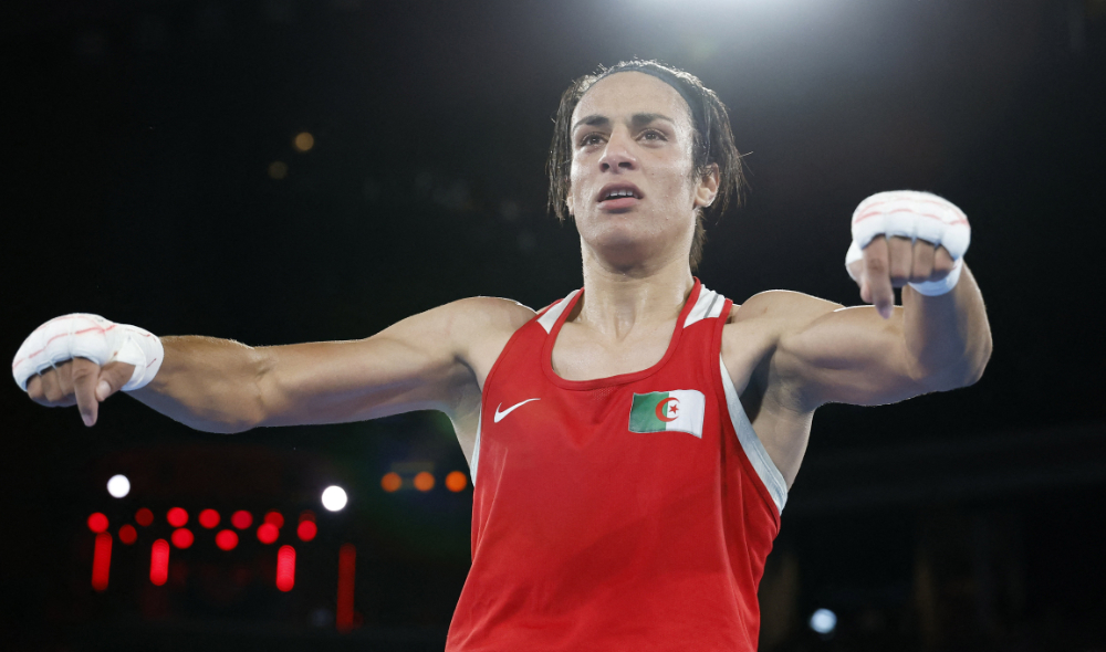 Imane Khelif of Algeria celebrates winning against Liu Yang of China. (Reuters)