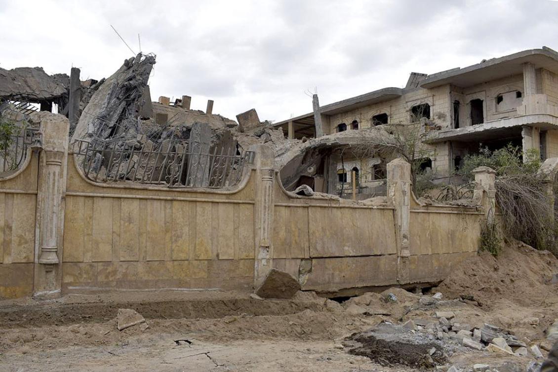 This picture taken on March 26, 2024 shows a view of a damaged building following an air strike in Syria's eastern city of Deir Ezzor. (File/AFP)