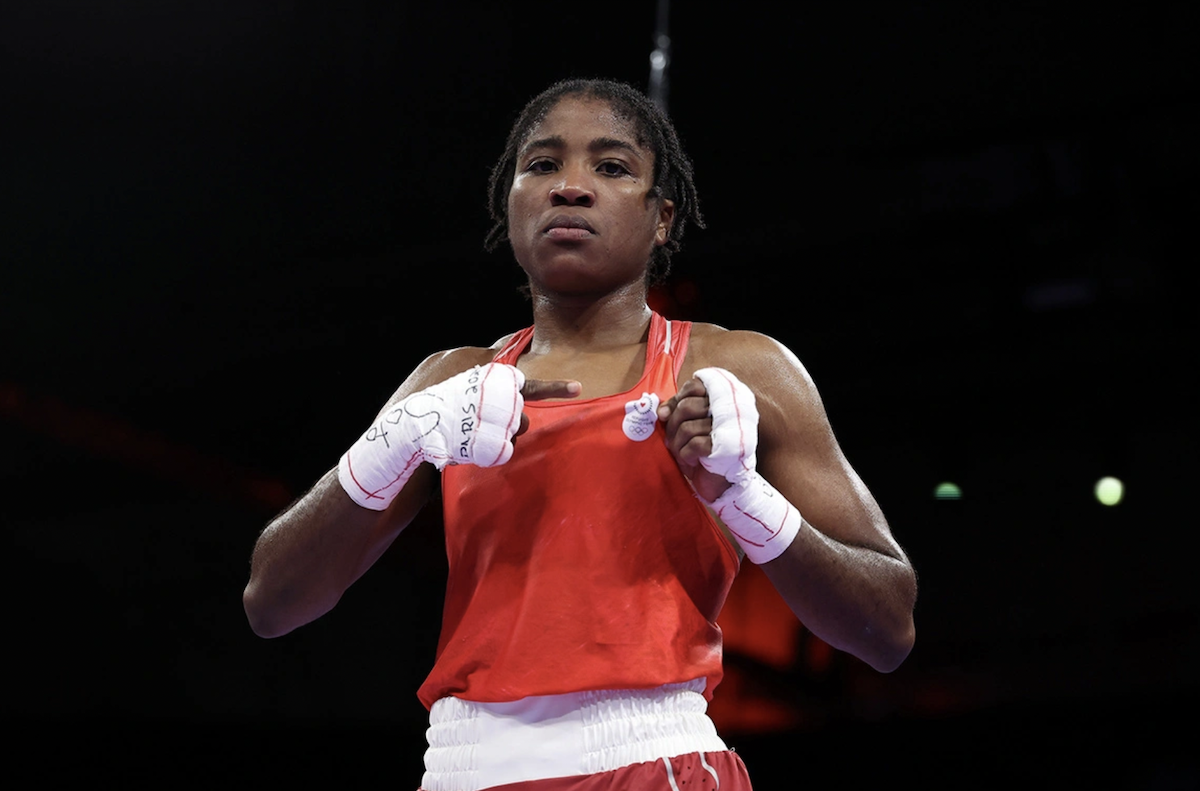 Cindy Ngamba, a boxer with the Refugee Olympic Team, after winning the women's 75kg quarter-final match against Davina Michel of Team France on Sunday. (Getty)