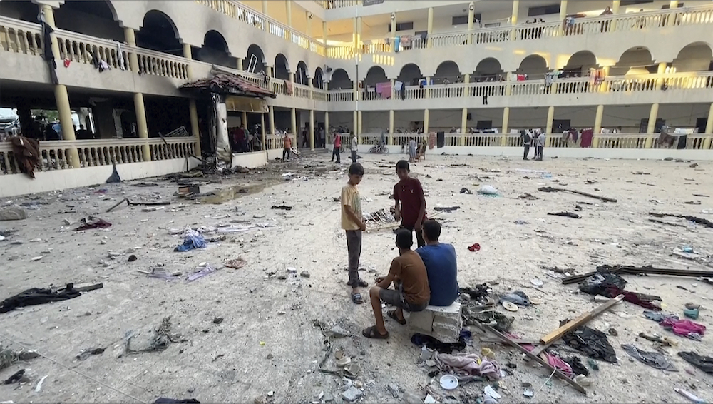 This image made from a video, shows the yard of a school after being hit by an Israeli airstrike in Gaza City Saturday, Aug. 10, 2024. (AP)