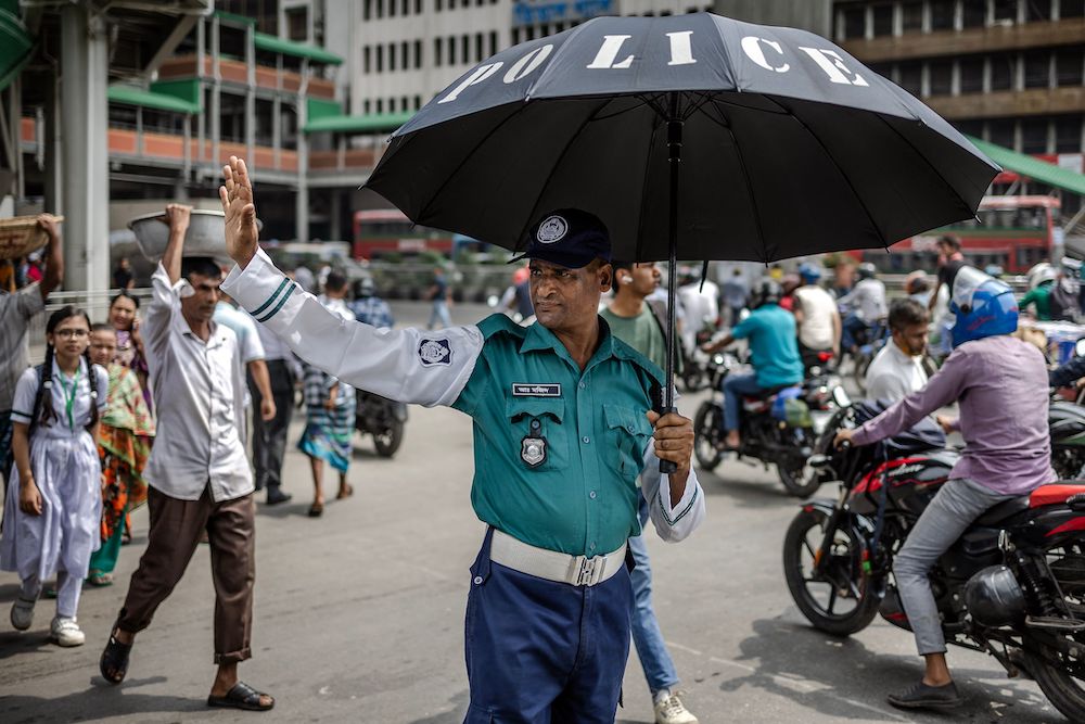 The Bangladeshi police agreed to return after late-night talks with the new interim government, helmed by Nobel laureate Muhammad Yunus. (AFP)