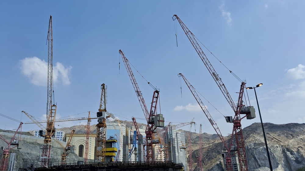 A view of drilling rigs in a construction project in Makkah, Saudi Arabia. Shutterstock