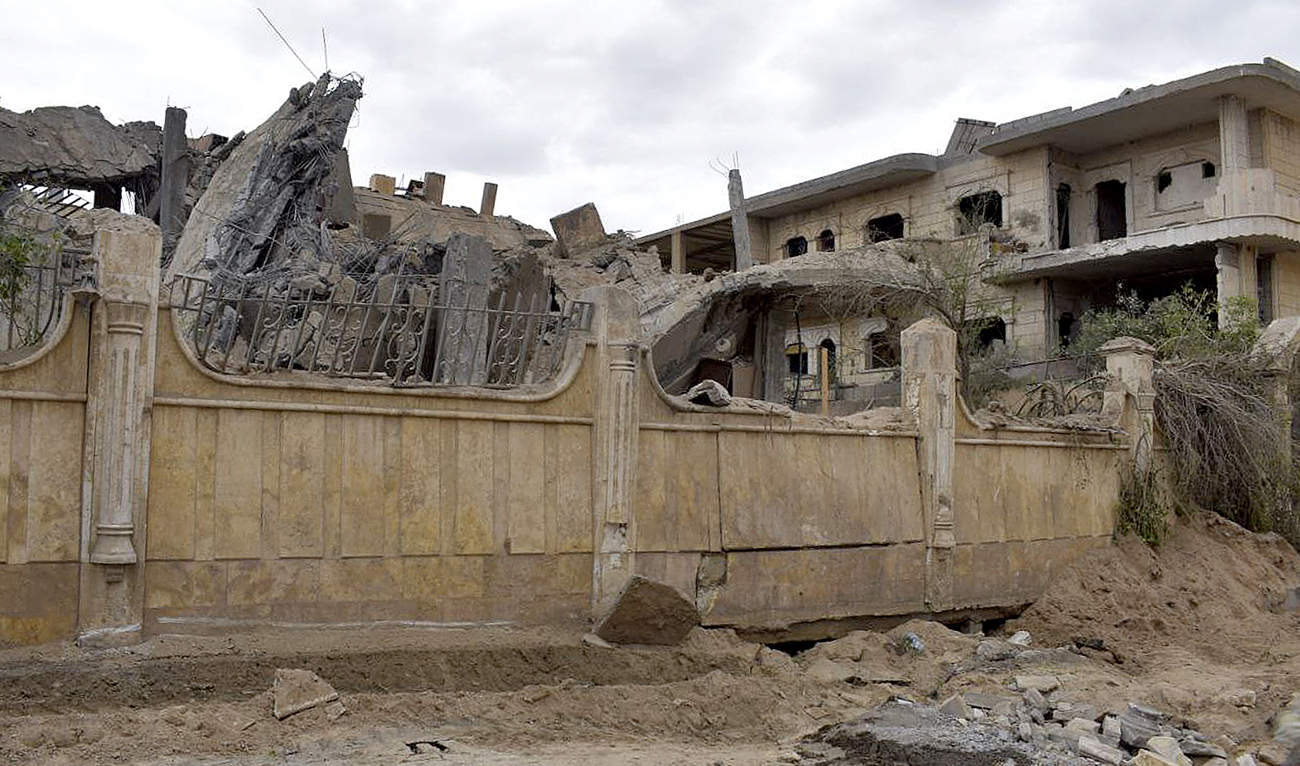 This picture taken on March 26, 2024 shows a view of a damaged building following an air strike in Syria's eastern city of Deir Ezzor. (AFP/File)