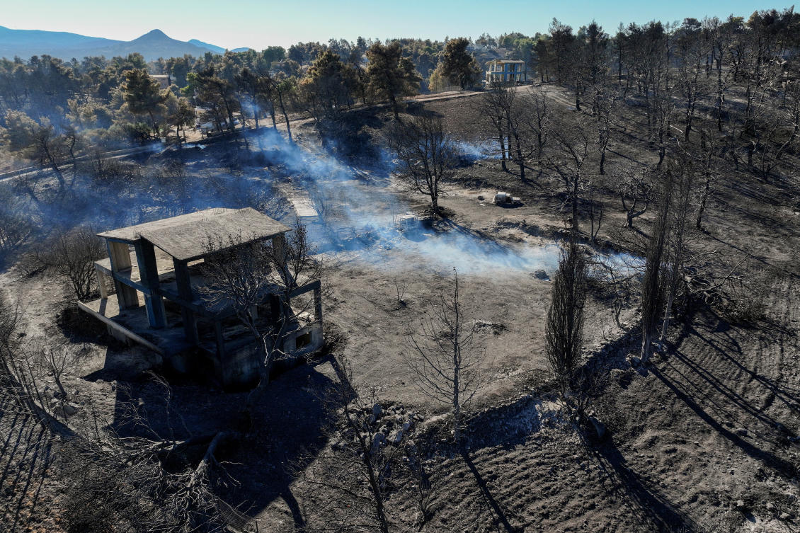 Greece has dealt with over 3,500 fires since May, a nearly 50 percent increase from the same period in 2023. Above, smoke rises in a charred forest area following a wildfire in the village of Varnavas on Aug. 13, 2024. (Reuters)