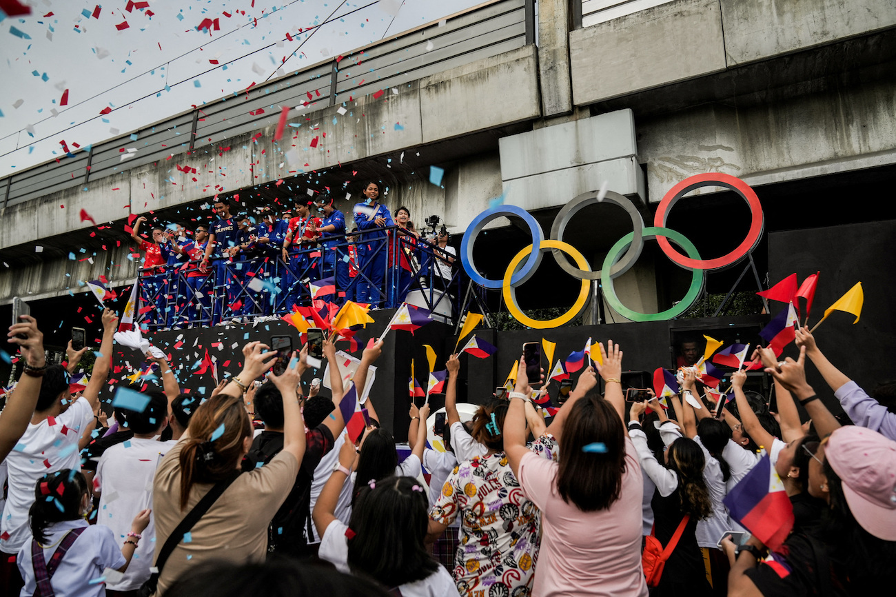 Filipino gymnast Carlos Yulo joins a welcoming parade for Filipino athletes who competed at the Paris 2024 Olympics, in Manila, Philippines, on Aug. 14, 2024. (Reuters)