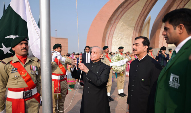 Prime Minister Shehbaz Sharif hoists Pakistan's national flag at the Pakistan Monument in Islamabad on August 14, 2024. (Photo courtesy: @CMShehbaz/X)