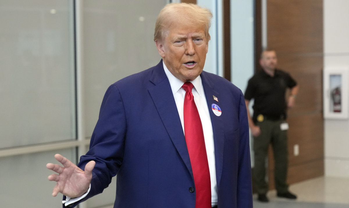 Republican presidential nominee former President Donald Trump talks at the Palm Beach County Supervisor of Elections, Wednesday, Aug. 14, 2024, in West Palm Beach, Fla., as he votes early in person in the Florida primary. (AP)
