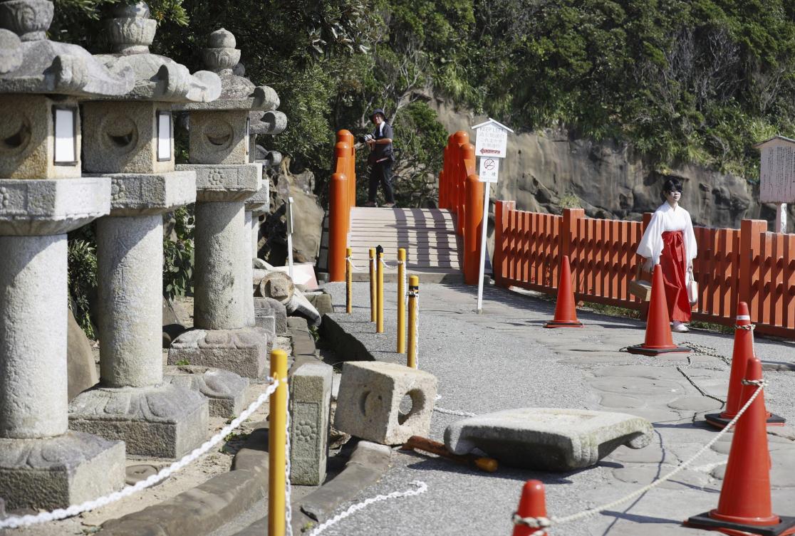 Above, fallen stone lanterns at a shrine following a strong earthquake in Nichinan, Miyazaki prefecture of southern Japan on Aug. 9, 2024. A week-old warning that a ‘megaquake’ potentially causing colossal damage and loss of life could strike was set to be lifted. (Kyodo News via AP)