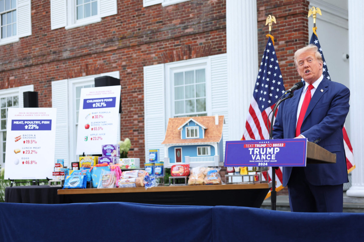 With groceries as props, Republican presidential candidate Donald Trump attacks the economic record of his Democratic rival, Vice President Kamala Harris, during a news conference at Trump National Bedminster Clubhouse on August 15, 2024 in Bedminster, New Jersey. (Getty Images/AFP)