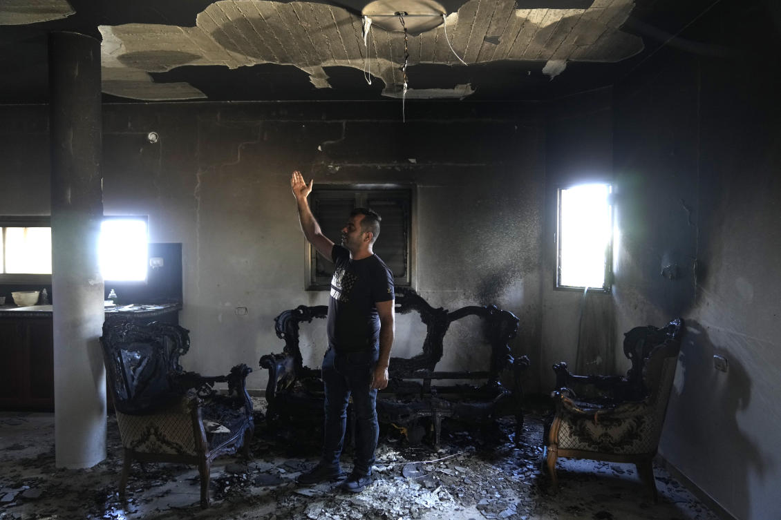A Palestinian stands in his home the morning after it was torched in a rampage by Israeli settlers in the West Bank village of Jit on Aug. 16, 2024. (AP)