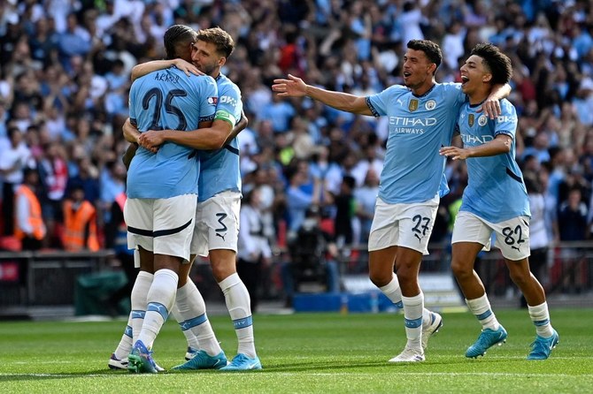 Manchester City will be without Rodri for the start of their Premier League title defence after Pep Guardiola revealed the Spain midfielder has been ruled out of Sunday's opener against Chelsea. (AFP/File)