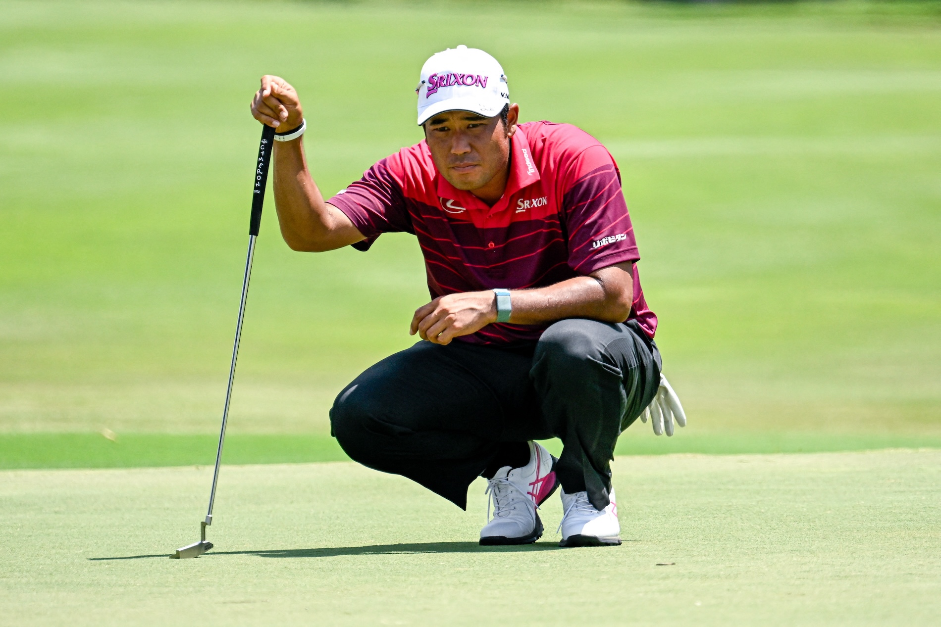 Hideki Matsuyama lines up a putt on the 17th green during the second round of the FedEx St. Jude Championship golf tournament at TPC Southwind Friday. (USA TODAY Sports)