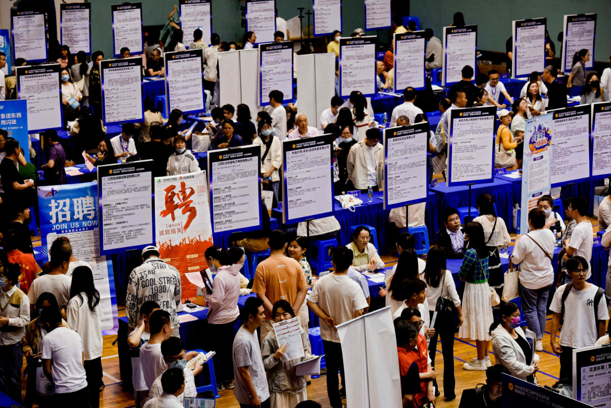 This photo taken on June 2, 2024 shows people attending a job fair in Huai'an, in eastern China's Jiangsu province. (AFP)