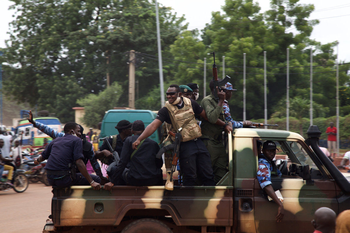 File photo showing Malian soldiers driving through the streets of Bamako, Mali. Local officials say at least 15 government soldiers were killed in an attack blamed on Al-Qaeda-linked jihadists in central Mali on Thursday. (AFP)