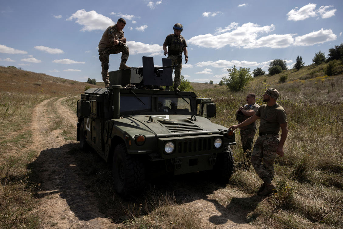 Soldiers of Ukraine's 22nd Separate Mechanised Brigade stand atop a Humvee military vehicle during an exercise in the Sumy region near the Russian border, amid Russia's attack on Ukraine. (File/Reuters)