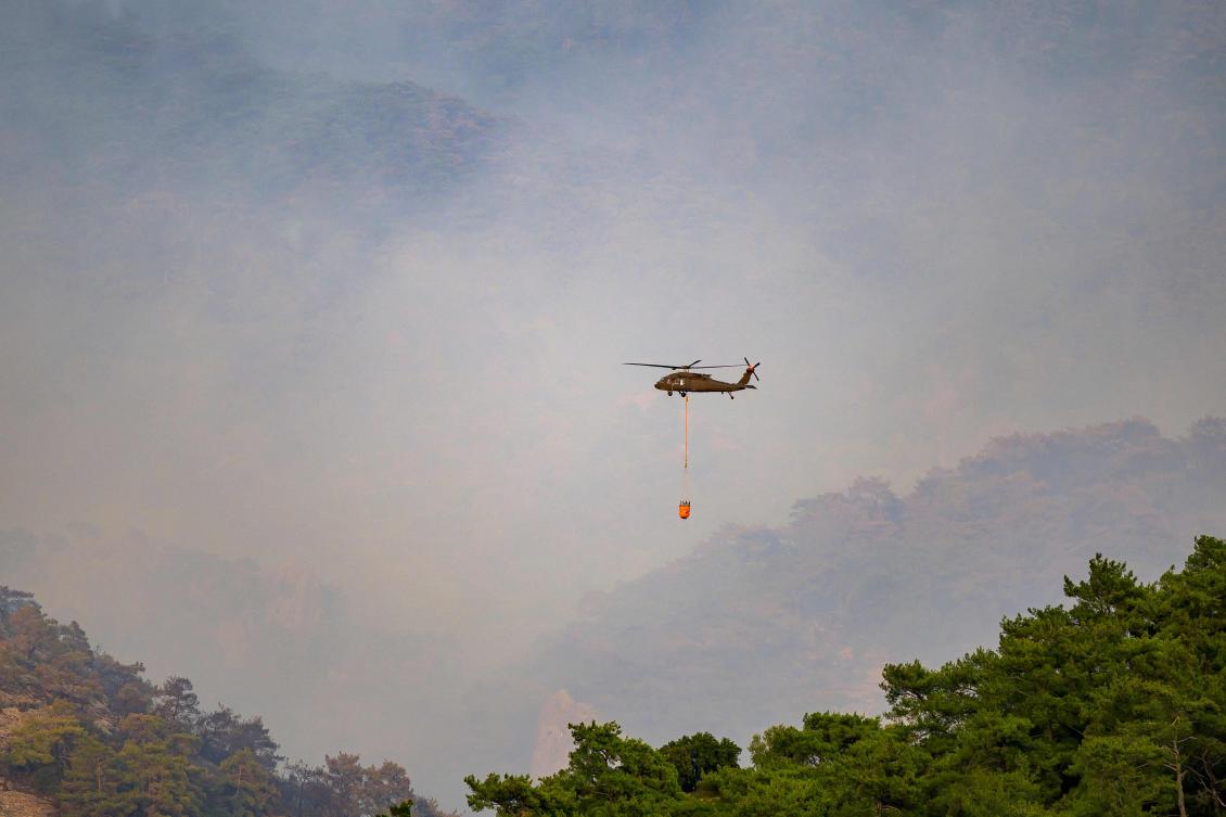 Firefighters are battling a strong forest fire in the Aegean resort city of Izmir for a third day, on August 17, 2024, with hundreds more people evacuated overnight. (File/AFP)