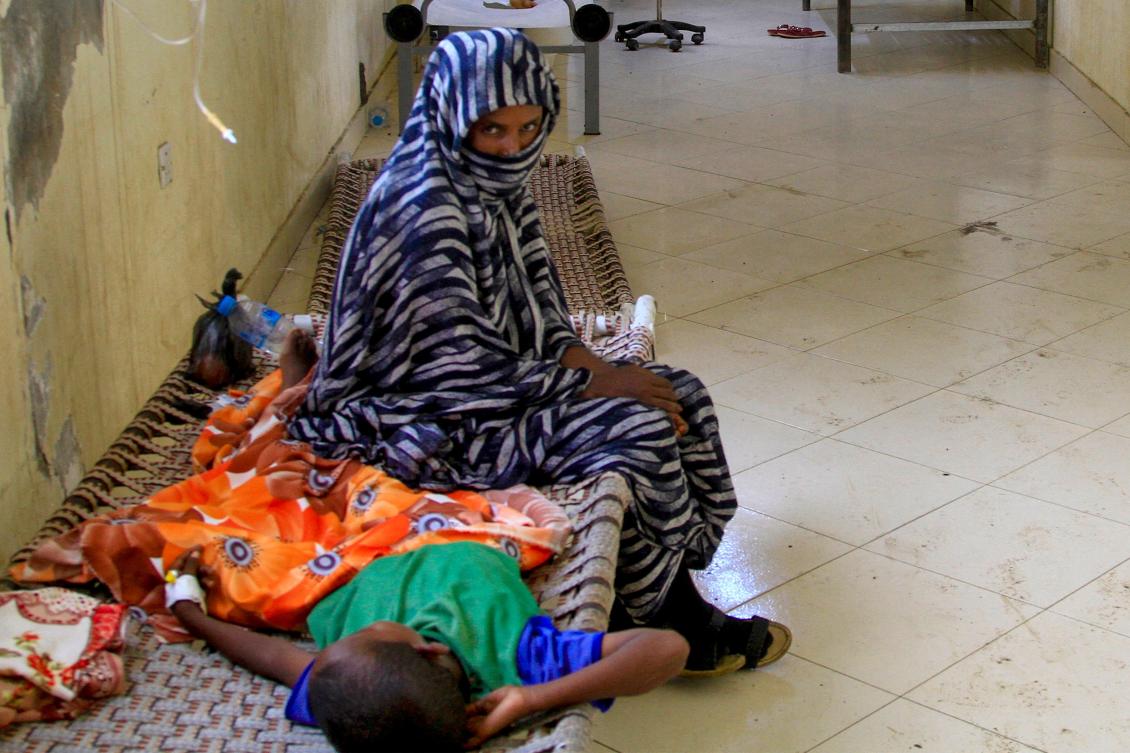 A child suffering from cholera receives treatment at a rural isolation center in Wad Al-Hilu in Kassala state in eastern Sudan, on August 17, 2024. Sudan’s health minister on August 17 declared a cholera epidemic after weeks of heavy rain in the war-torn country, in a video released by his ministry. (AFP)