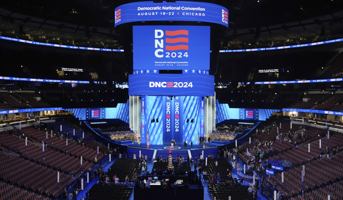 Workers prepare the convention floor at United Center before the Democratic National Convention Sunday, Aug. 18, 2024, in Chicago. (AP)
