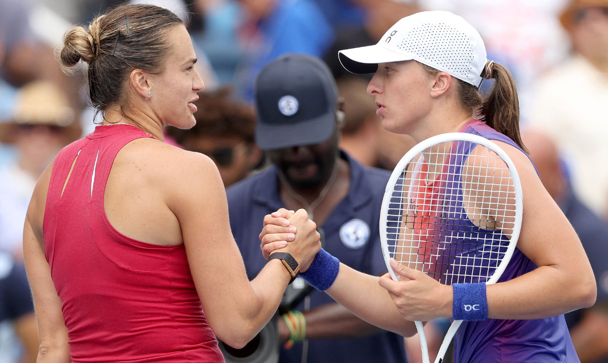 Aryna Sabalenka of Belarus is congratulated by Iga Swiatek of Poland after their match during the semifinals on Day 8 of the Cincinnati Open at the Lindner Family Tennis Center on August 18, 2024 in Mason, Ohio. (AFP)