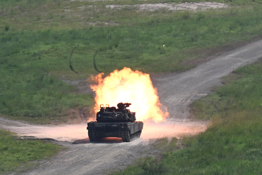 US M1A2 Abrams battle tank fires live rounds during a live-fire military drill at the Rodriguez Live Fire Complex in Pocheon in order to master their proficiency for quick responses from the US. (File/AFP)