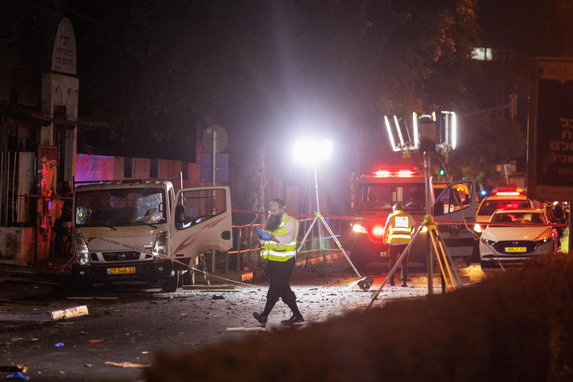 Israeli security and emergency responders work at the site of a bomb blast in Tel Aviv, Israel. (File/Reuters)