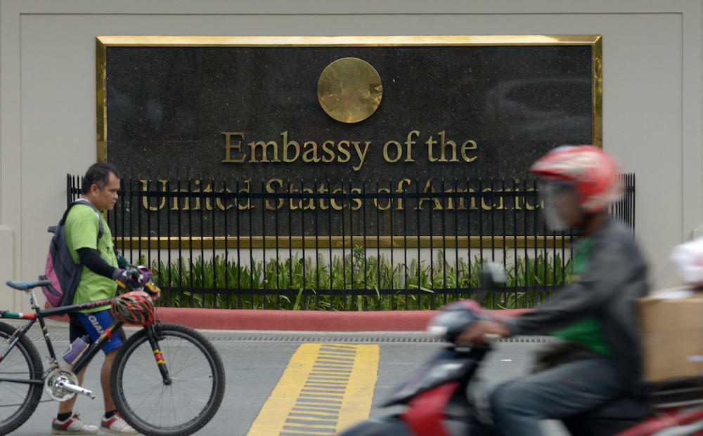 Afghans can stay in the Philippines for no more than 59 days and will be ‘confined to their billet facility’ except for their embassy consular interview. Above, the US embassy in Manila. (AFP file photo)