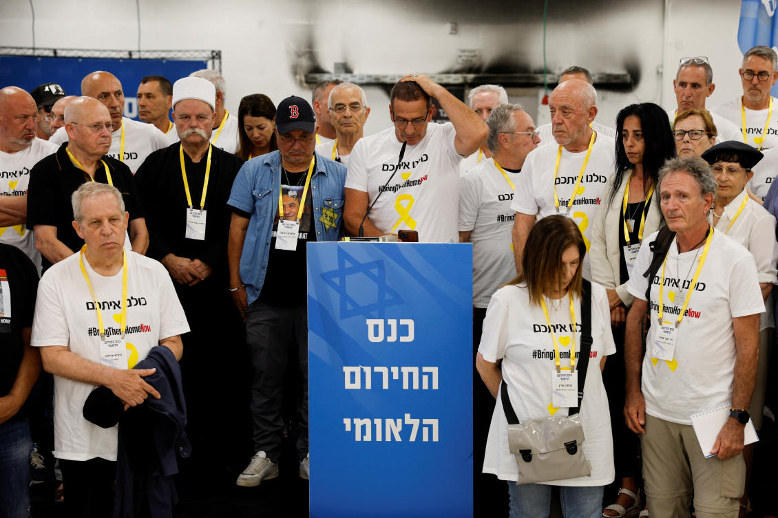 Members of Kibbutz Nir Oz and Israeli officials hold a conference calling on Israeli Prime Minister Benjamin Netanyahu and his government to secure a deal (Reuters)