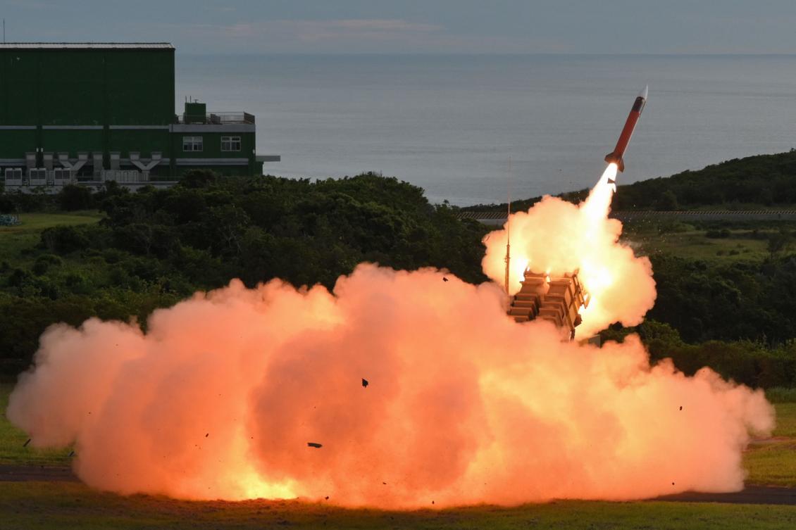 Above, a US-made MIM-104 Patriot surface-to-air missile is launched during a live fire exercise at the Chiupeng missile base in Pingtung county on Aug. 20, 2024. (AFP)