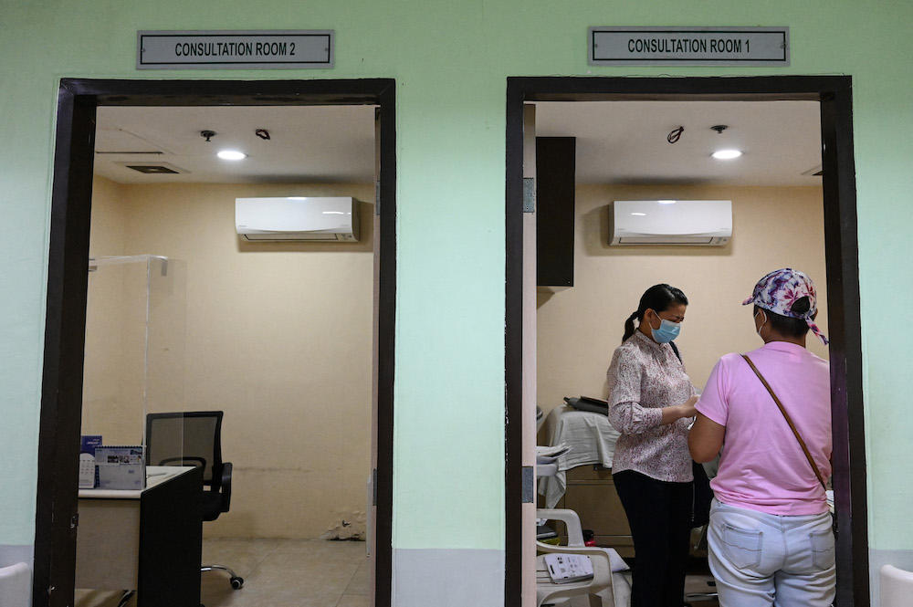 The first mpox patient reported by the Philippines this year remains confined in a hospital, health authorities say. Above, patients queue for consultation at a hospital in Quezon City. (AFP file photo)