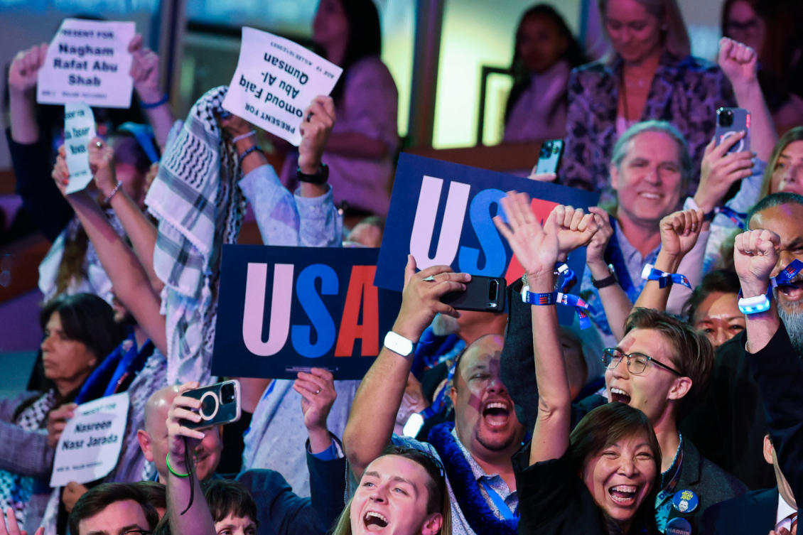 Members of the Hawaii delegation hold signs with the names of people killed in Gaza during the roll call of states on Day 2 of the Democratic National Convention (DNC) at the United Center, in Chicago, Illinois, U.S., August 20, 2024. (Reuters)