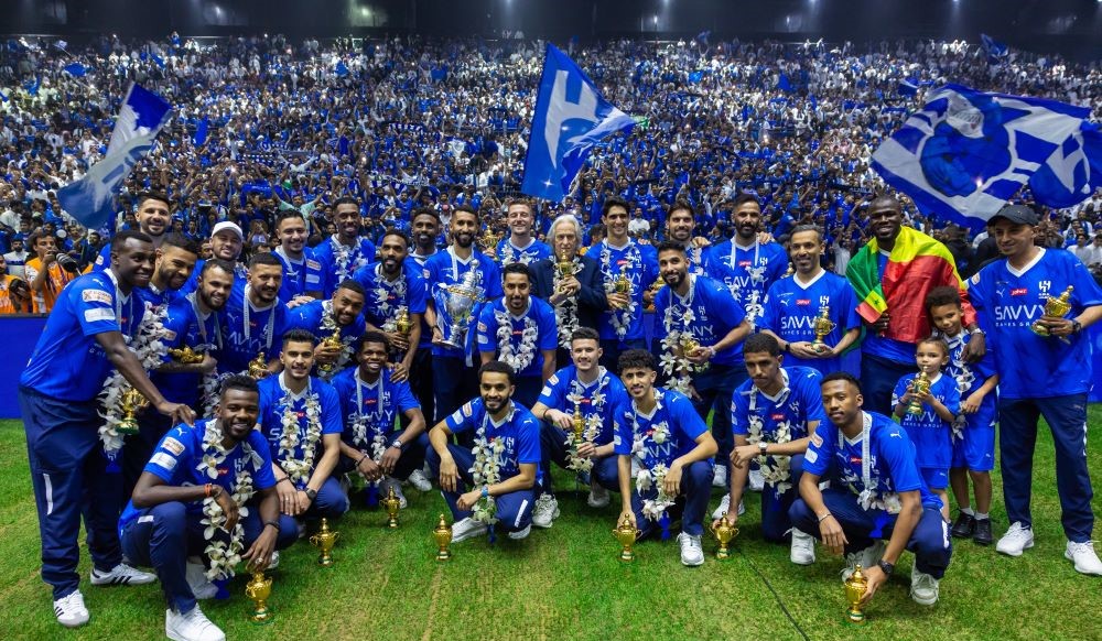 Al-Hilal celebrate winning the 2023-24 SPL title. (X/@Alhilal_EN)