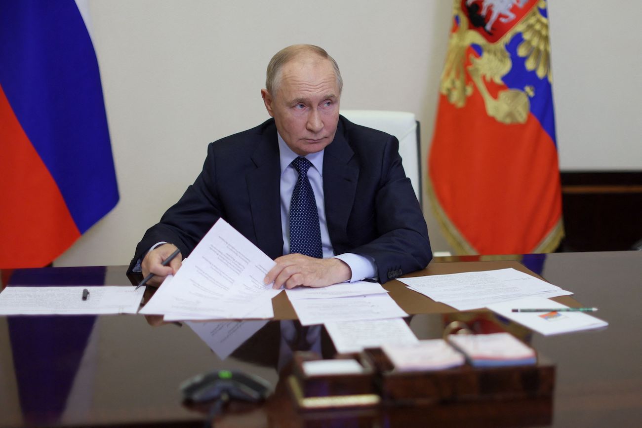 President Vladimir Putin chairs a meeting on situation in Belgorod, Kursk and Bryansk regions via video link at the Novo-Ogaryovo residence outside Moscow on August 22, 2024. (AFP)