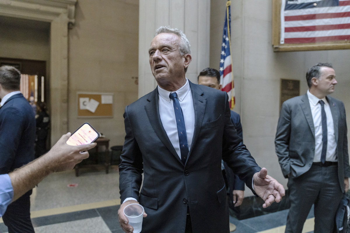 Independent presidential candidate Robert F. Kennedy Jr. speaks to reporters at the Nassau County Supreme Court in Mineola, New York, on Aug. 21, 2024. (AP Photo/Pool)